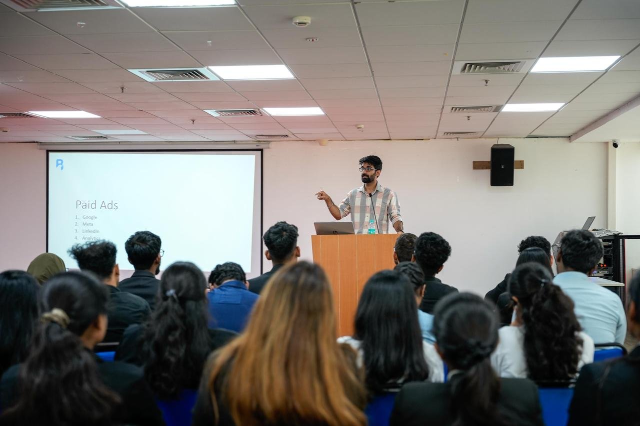 Shivam Singh presenting digital marketing on stage